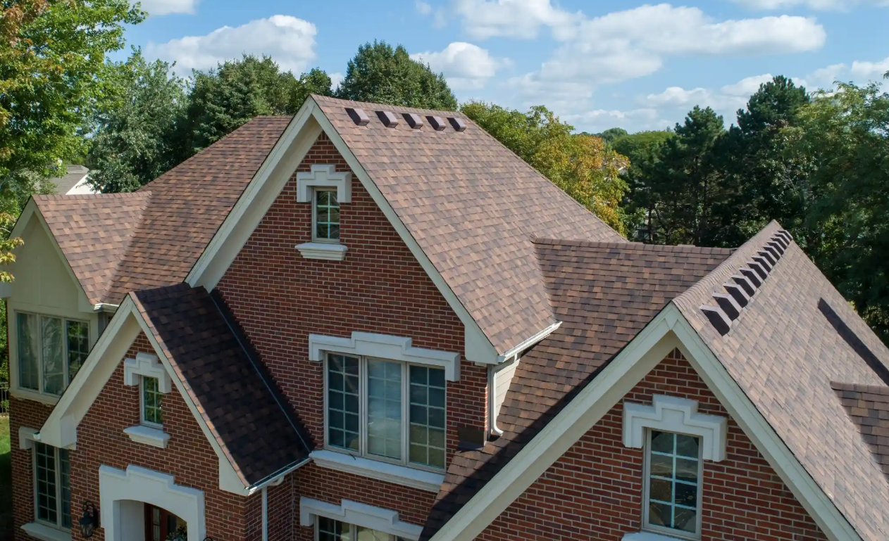 Brick GTA home with a new roof and attic ridge and soffit ventilation by Canadian Insulation Experts