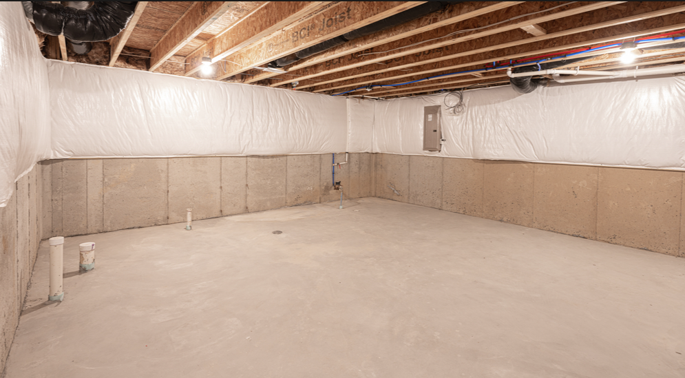 Canadian Insulation Experts basement with foundation walls insulated and sealed with vapour barrier in a Toronto home