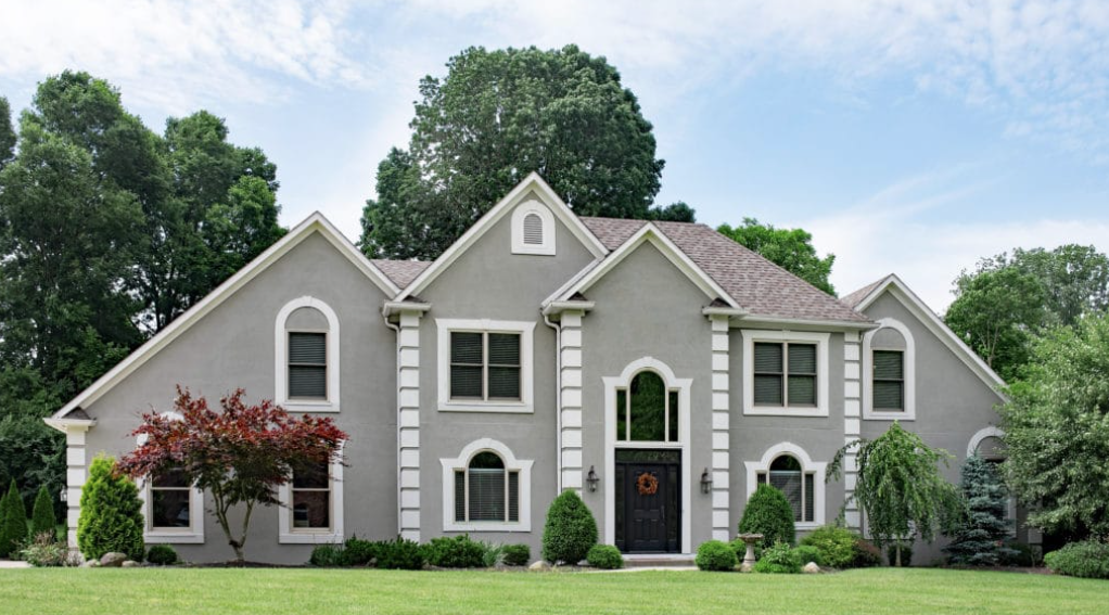 Grey stucco two-storey GTA home with exterior wall insulation by Canadian Insulation Experts
